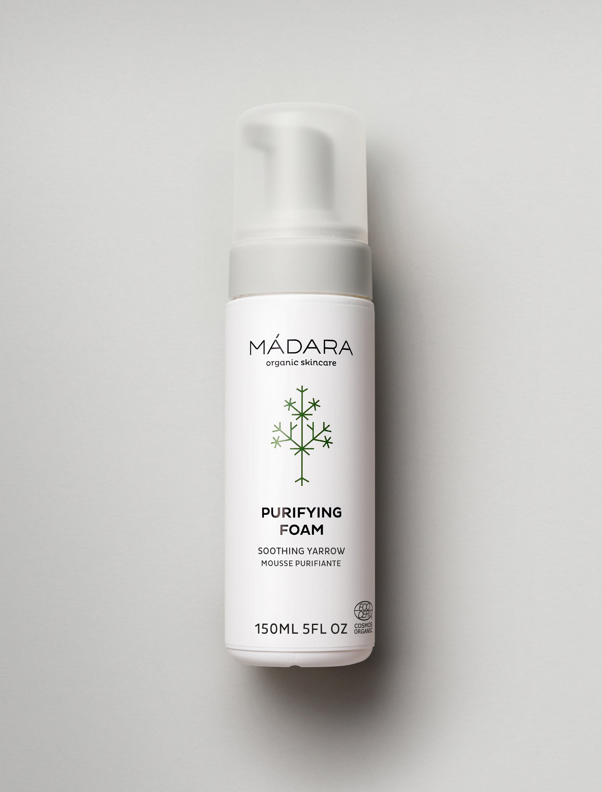 Mádara Purifying Foam bottle on a light gray background