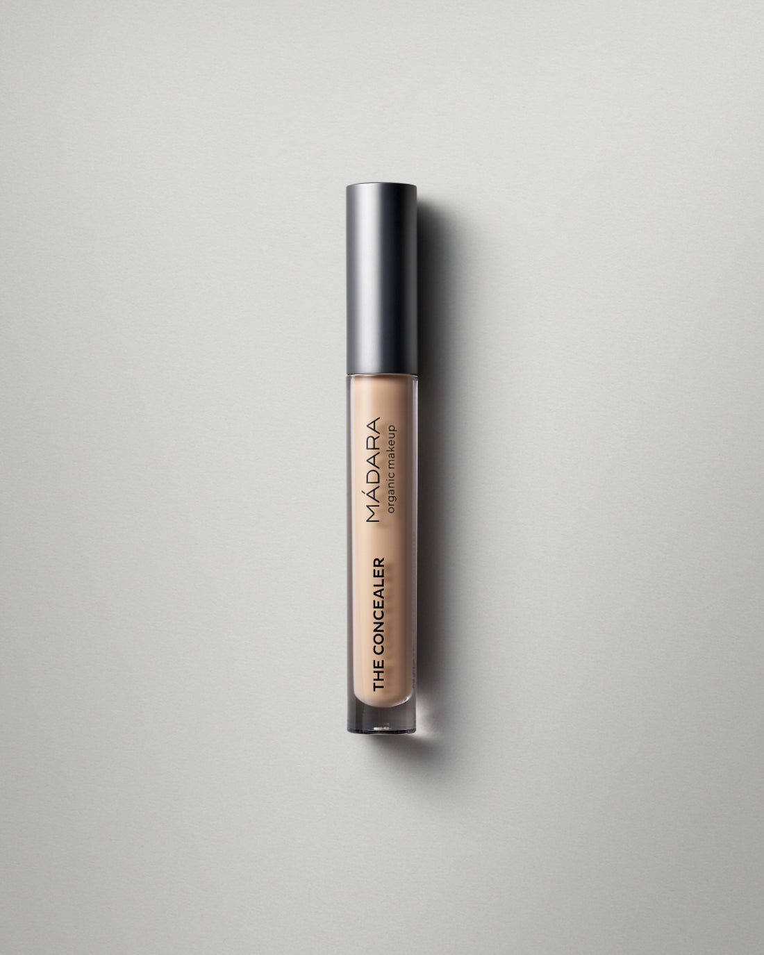 MÁDARA Organic Skincare concealer honey madara A6102 concealer product photo on plain background.
