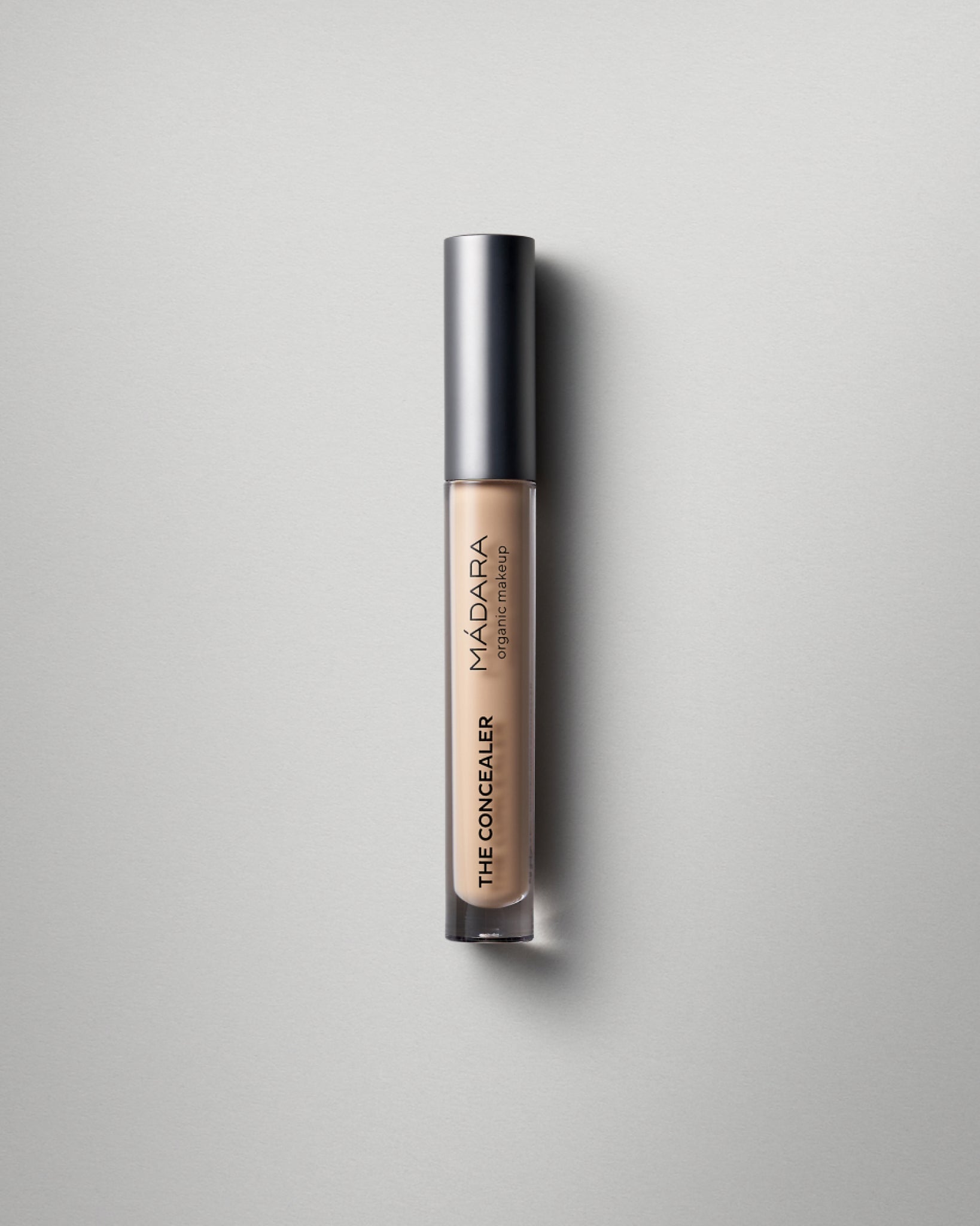 MÁDARA Organic Skincare concealer honey madara A6102 concealer product photo on plain background.