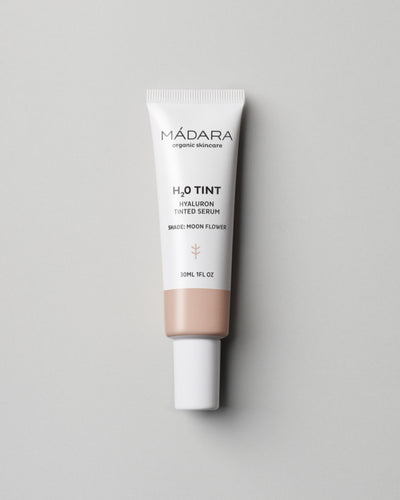 MÁDARA Organic Skincare hyaluron tinted serum moon flower A3512 serum product photo on plain background.