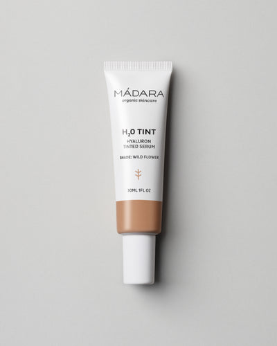 MÁDARA Organic Skincare hyaluron tinted serum wild flower A3514 serum product photo on plain background.