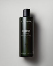 MÁDARA Organic Skincare gloss and vibrancy shampoo A4003 shampoo product photo on plain background.