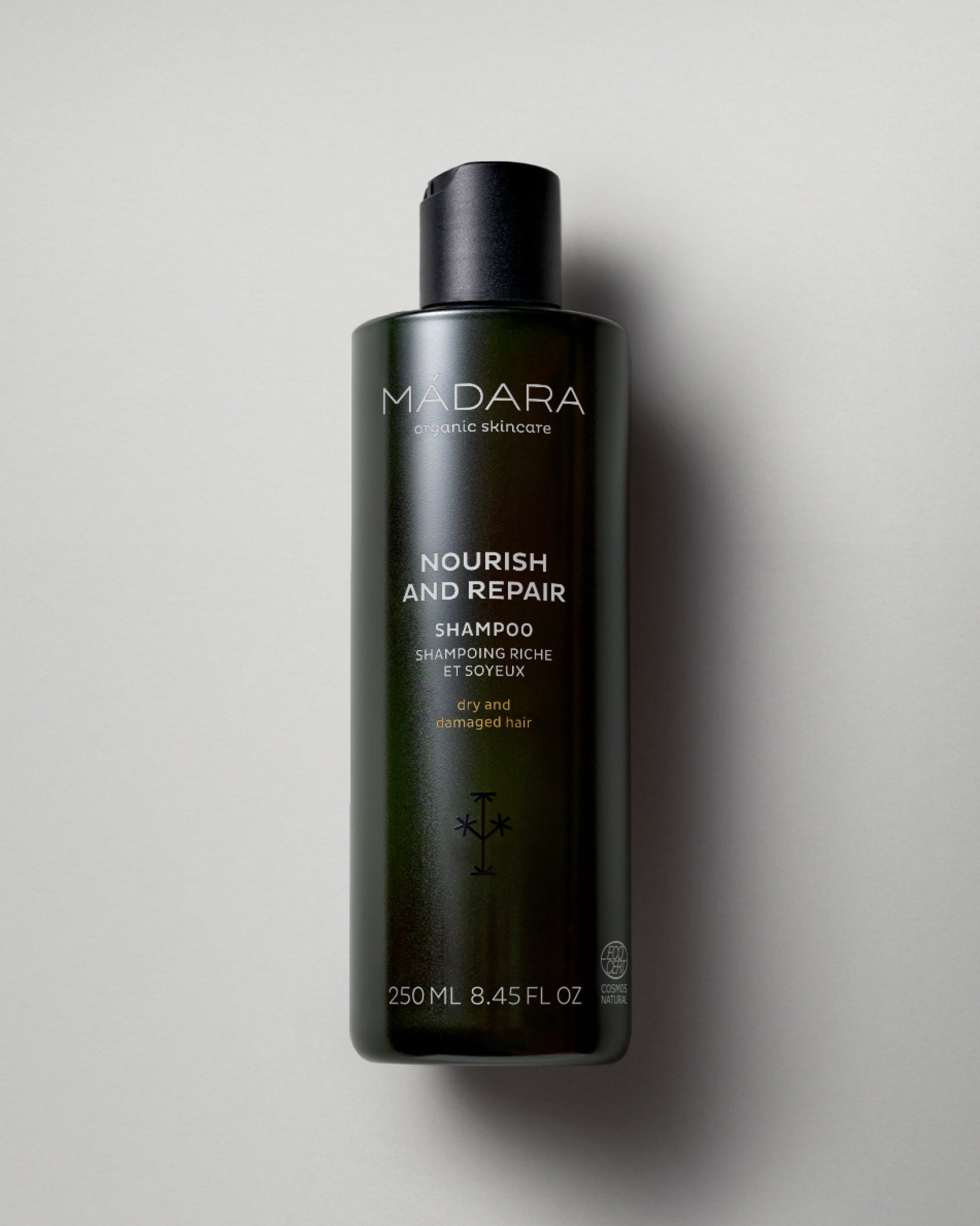 MÁDARA Organic Skincare nourish and repair shampoo A4001 shampoo product photo on plain background.