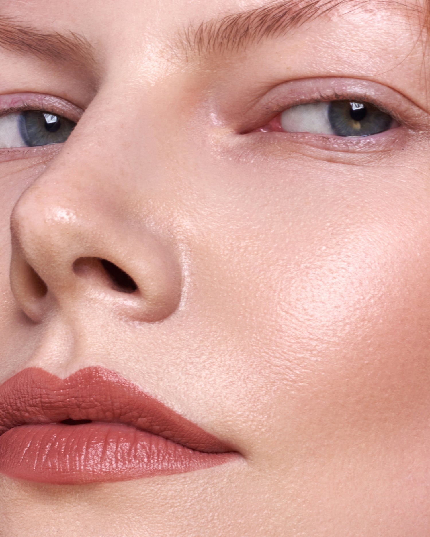 MÁDARA Organic Skincare warm nude lipstick A6302 product photo on plain background.