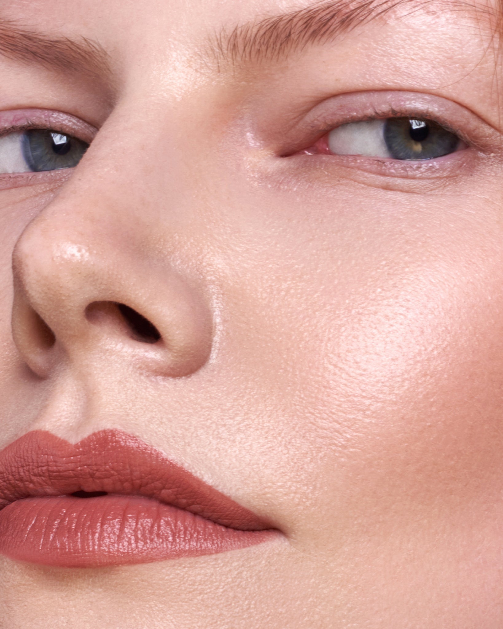 MÁDARA Organic Skincare warm nude lipstick A6302 product photo on plain background.