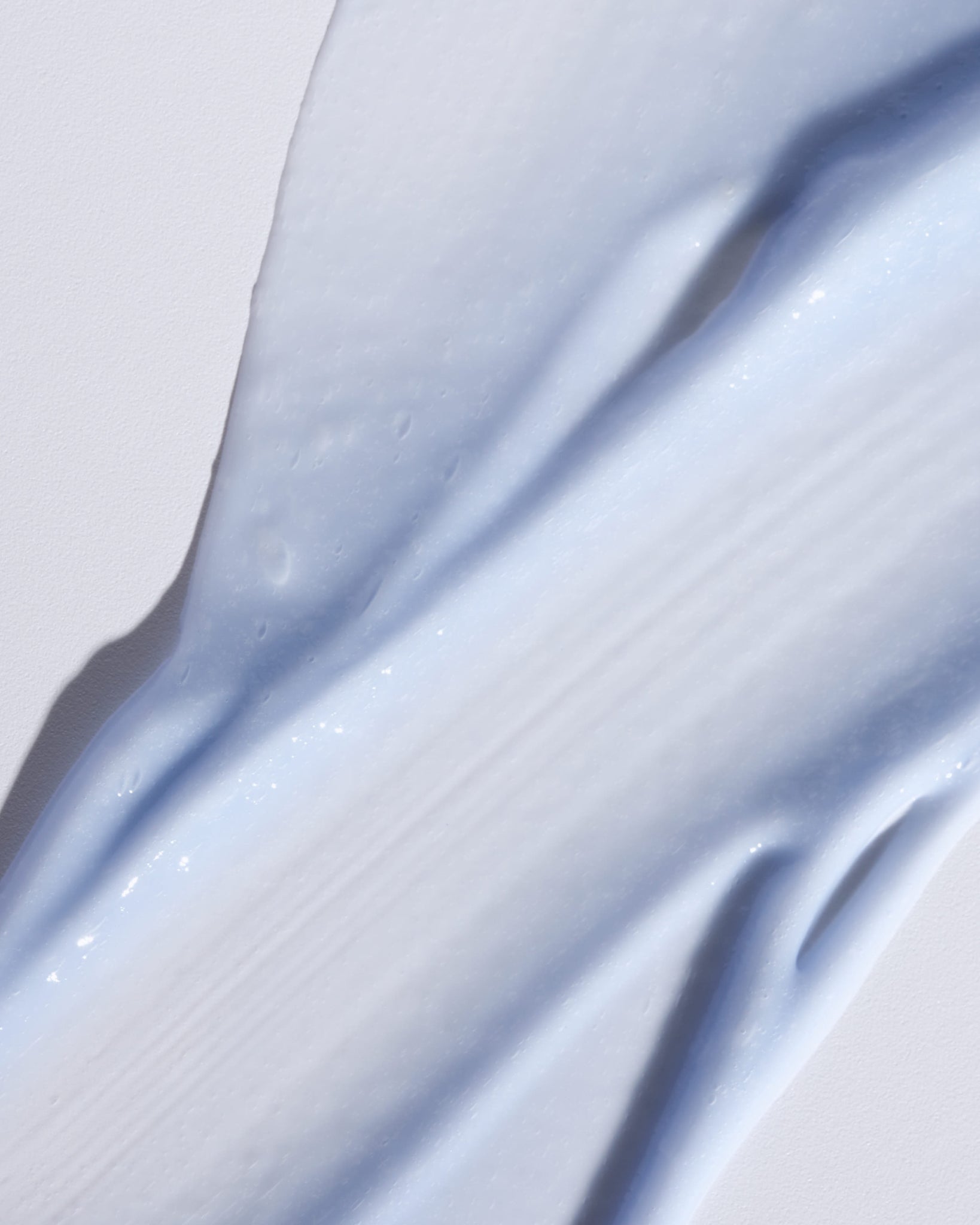 Texture close-up of MÁDARA Organic Skincare retinol alternative complex A3185 �swatch demonstrates consistency and finish.