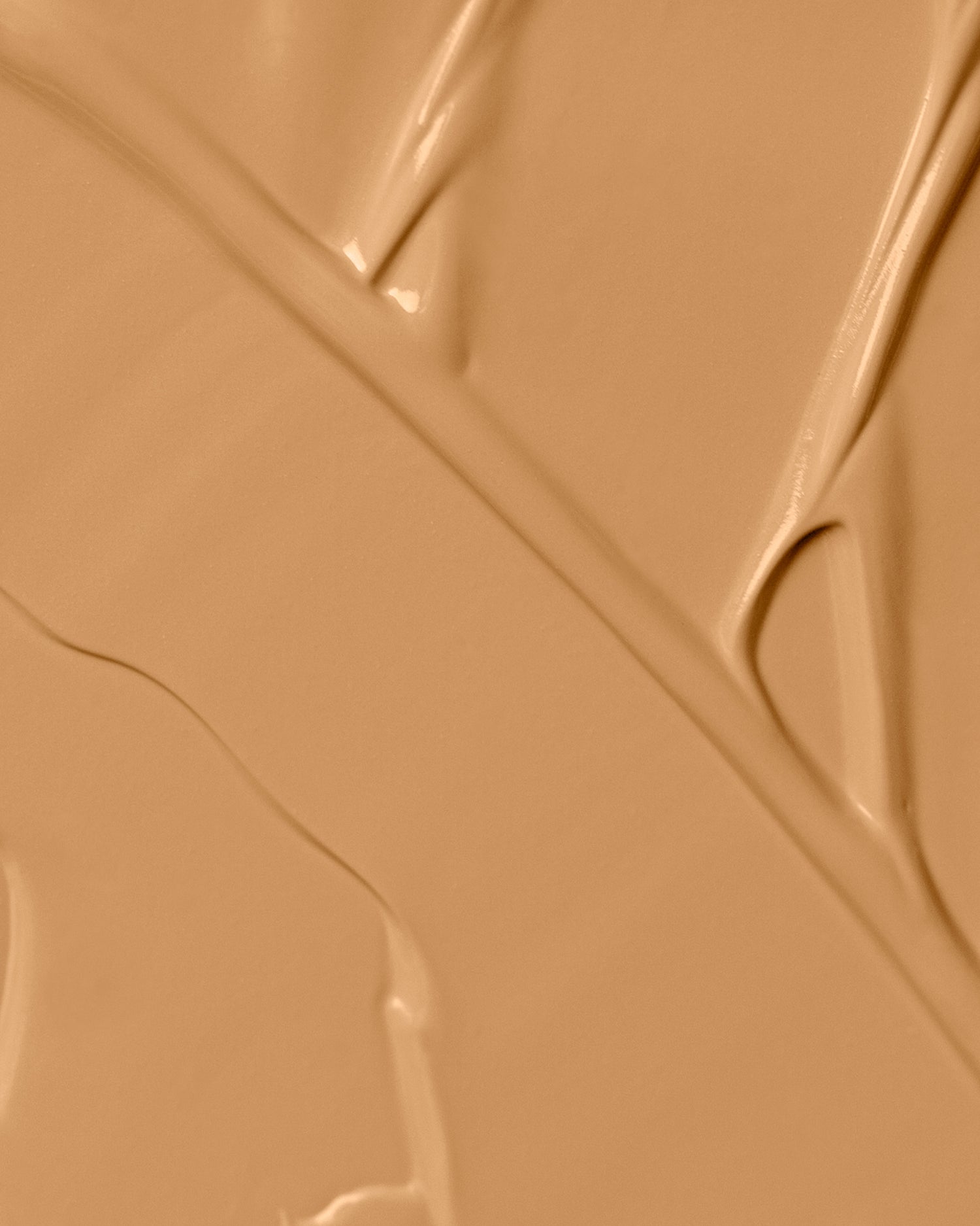 Texture close-up of MÁDARA Organic Skincare skinonym golden sand A6086 �swatch demonstrates consistency and finish.