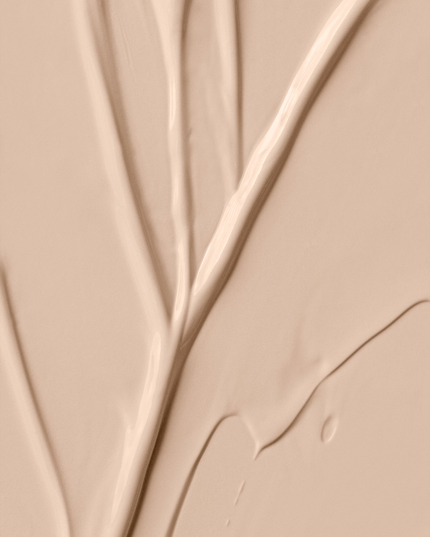 Texture close-up of MÁDARA Organic Skincare skinonym ivory A6082 �swatch demonstrates consistency and finish.