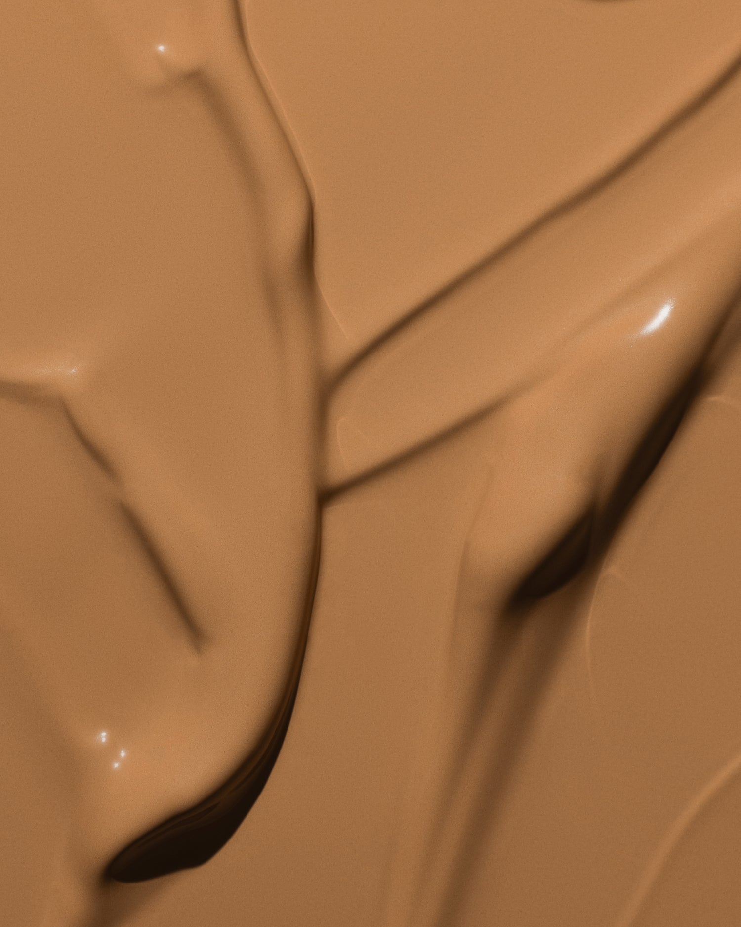 Texture close-up of MÁDARA Organic Skincare skinonym olive A6091 �swatch demonstrates consistency and finish.