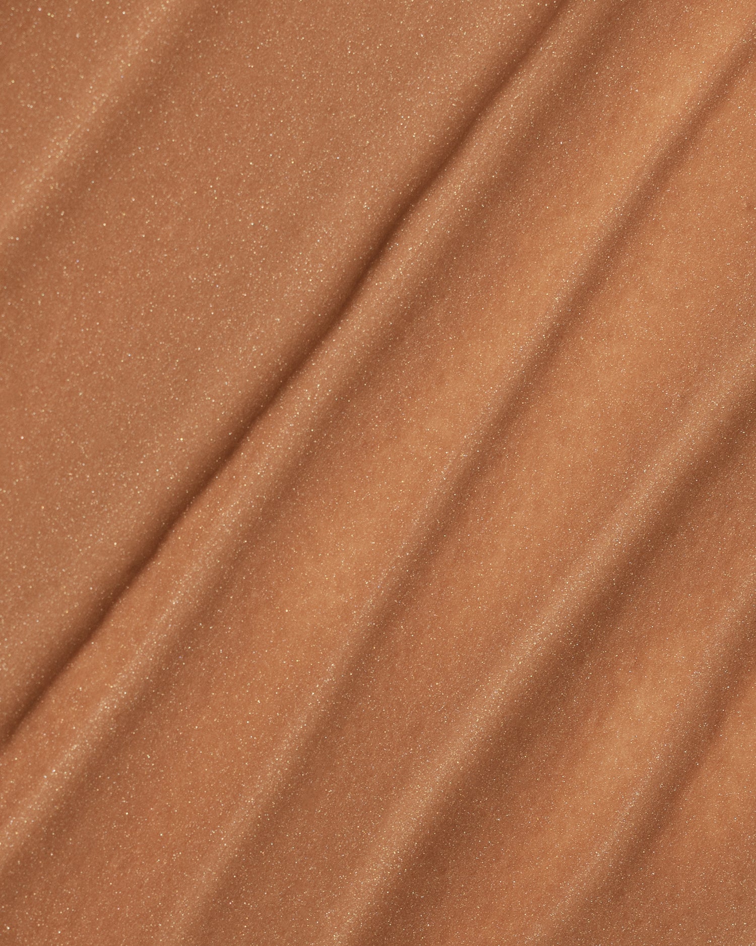 Texture close-up of MÁDARA Organic Skincare wild flower A3514 �swatch demonstrates consistency and finish.