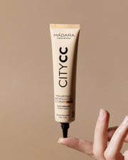 MÁDARA Organic Skincare organic cc cream meidum A3412 face cream product photo on plain background.