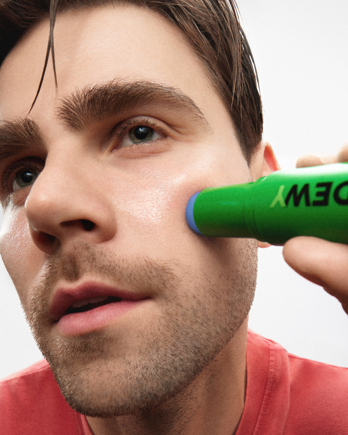 MADARA DEWY caffeine face serum stick on male model