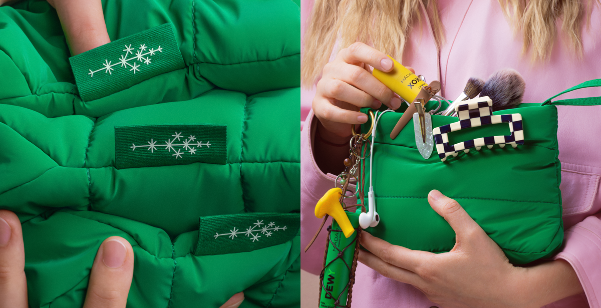 Woman holding a green MÁDARA cosmetic bag filled with beauty essentials and accessories