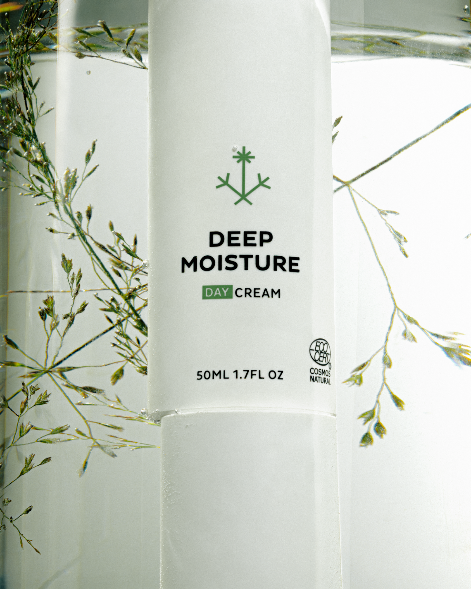  'Deep Moisture Day Cream' with greenery in the background