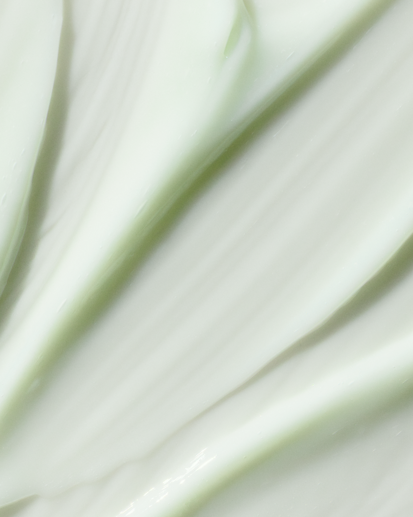 Close-up of light green moisturiser 