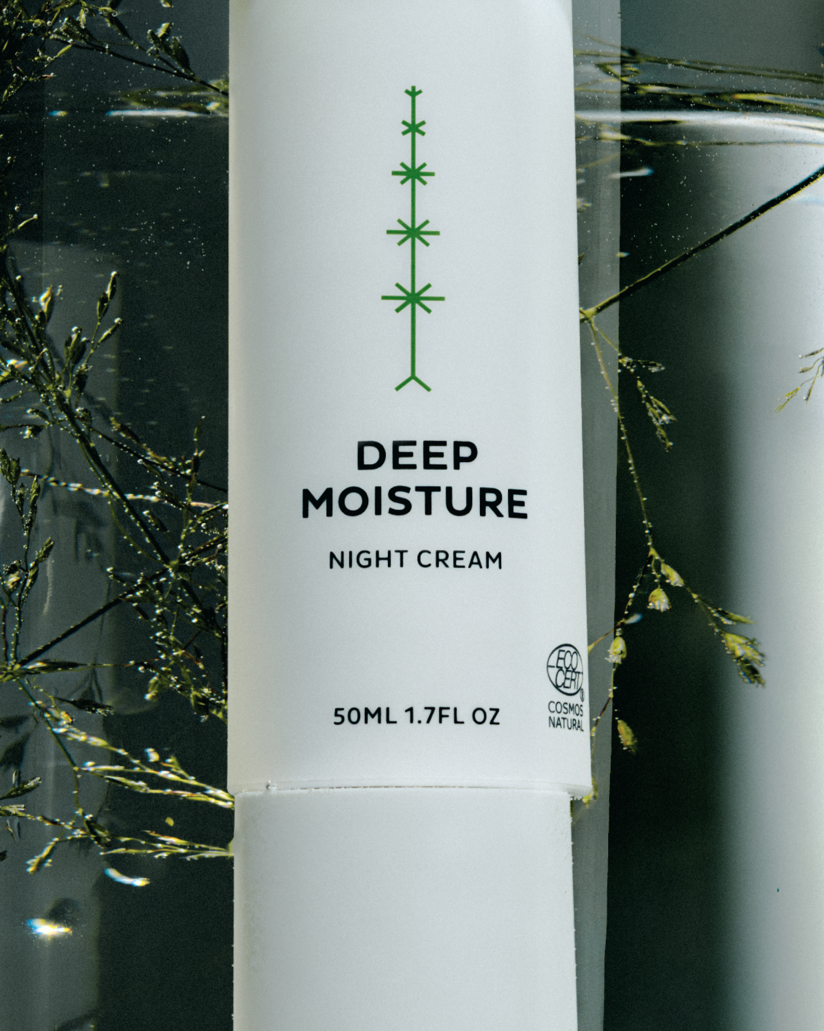 deep moisture night cream on a dark background